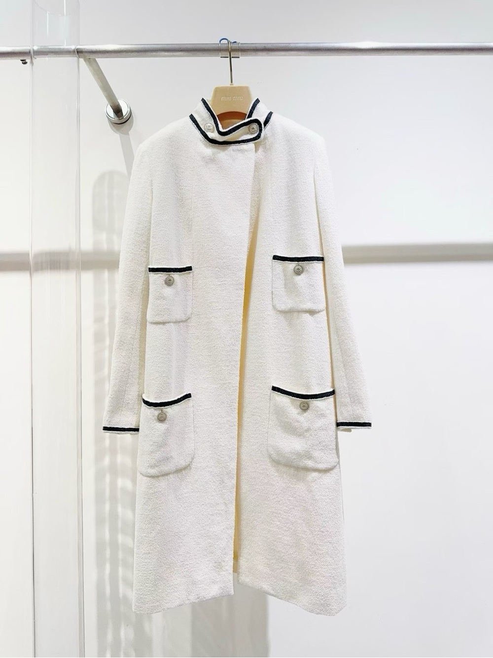CHANEL White Bouclé Longline Coat with Black Trim